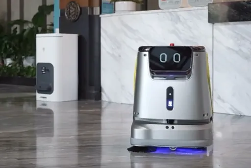Cleaning robot working in a commercial building lobby